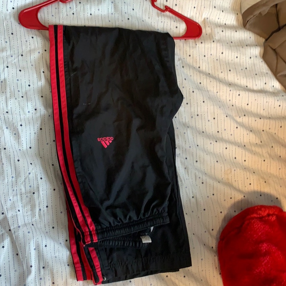 Adidas jogging pants with black netting inside size small women’s